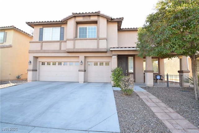 view of front of home with a garage