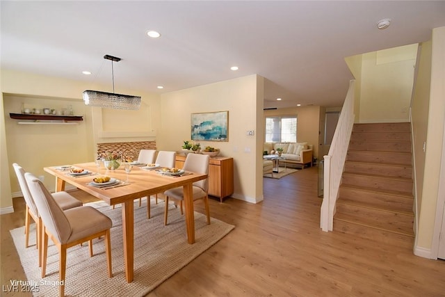 dining room with light hardwood / wood-style flooring