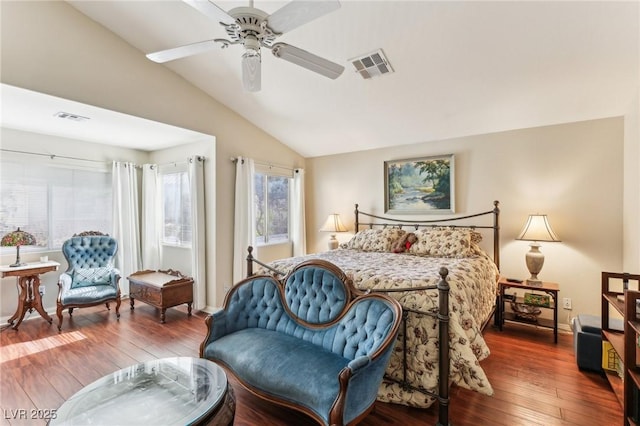 bedroom featuring hardwood / wood-style flooring, vaulted ceiling, and ceiling fan