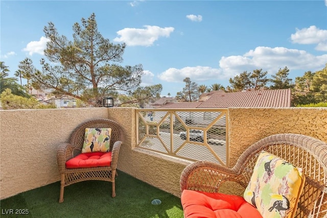 view of patio / terrace with a balcony