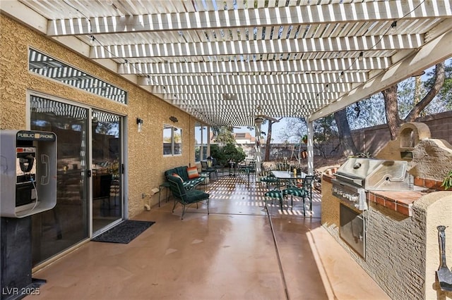 view of patio / terrace with area for grilling, a grill, and a pergola