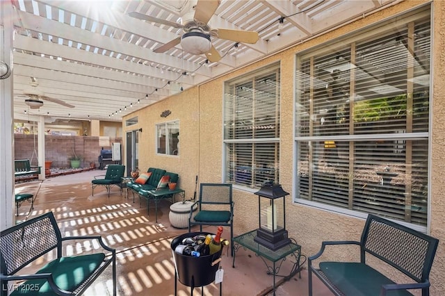 view of patio featuring a pergola and ceiling fan