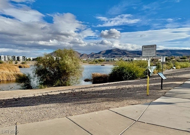 property view of water featuring a mountain view