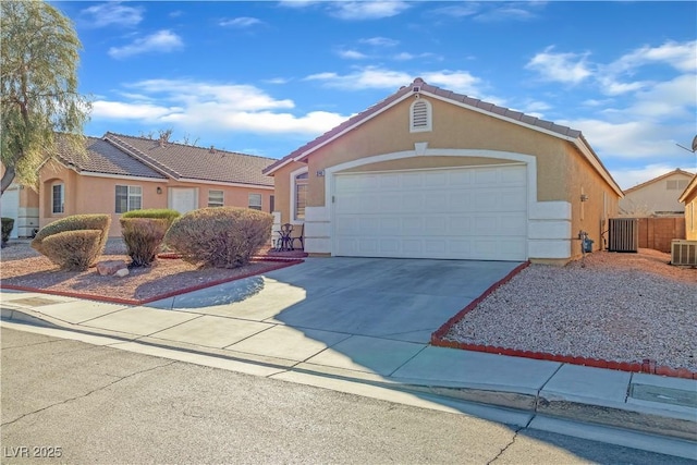 ranch-style home featuring a garage