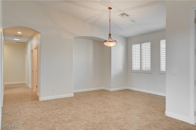 empty room featuring light tile patterned floors