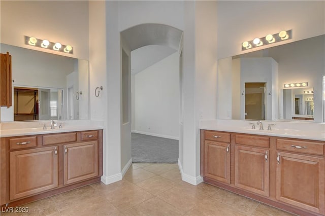 bathroom with vanity and tile patterned floors