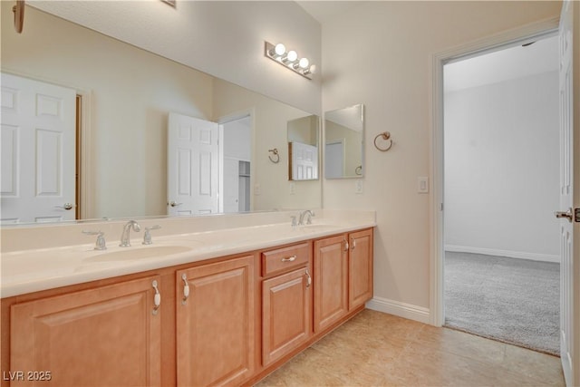 bathroom featuring tile patterned floors and vanity