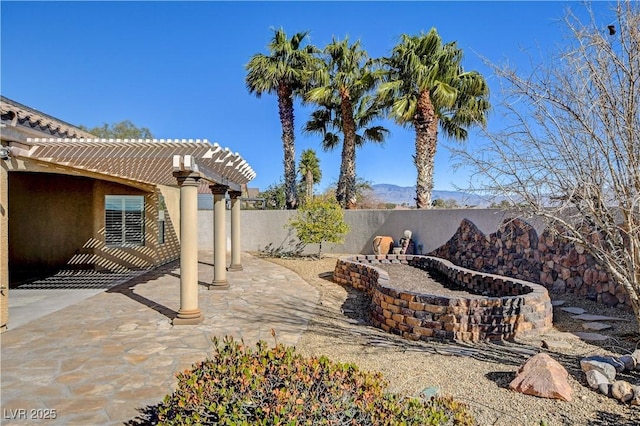 view of patio featuring a pergola