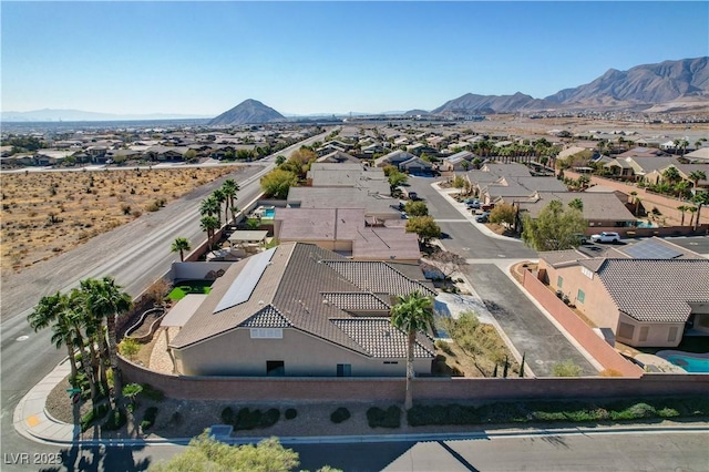 drone / aerial view featuring a mountain view