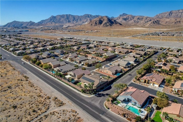 drone / aerial view featuring a mountain view