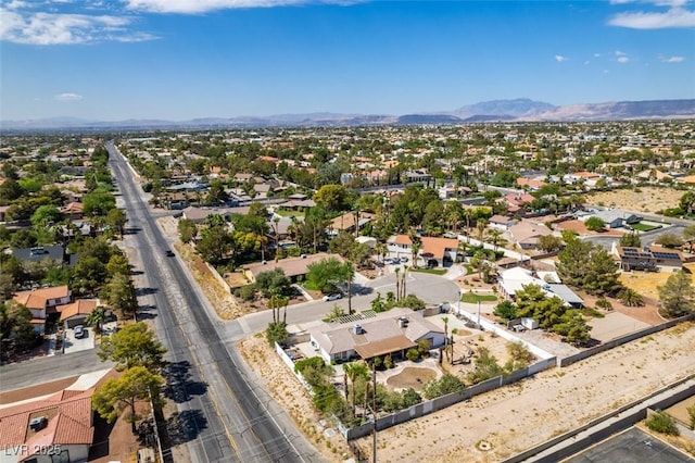 drone / aerial view featuring a mountain view