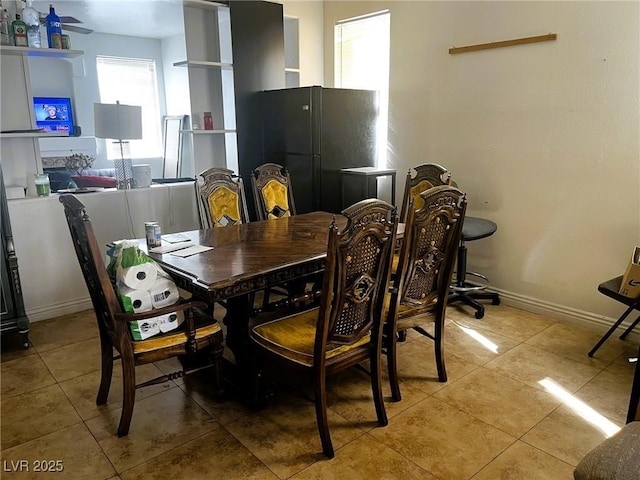 dining room with tile patterned flooring