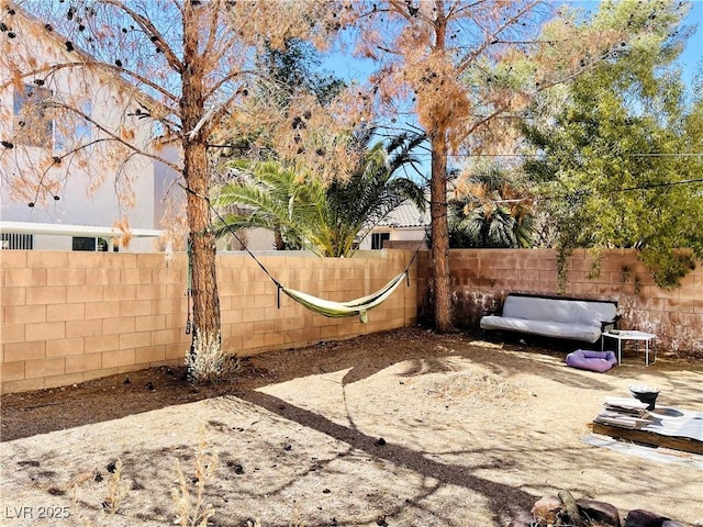 view of yard featuring a fenced backyard