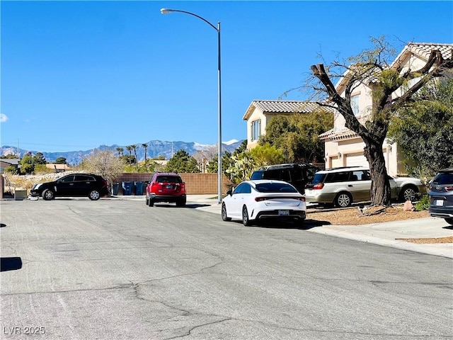 view of street with street lighting and a mountain view