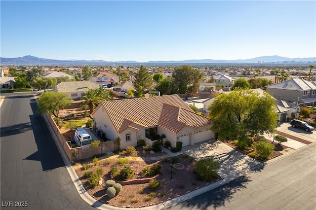 bird's eye view featuring a residential view and a mountain view