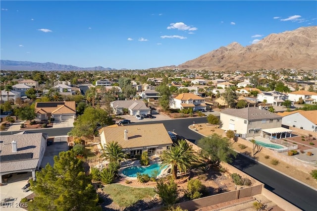 bird's eye view featuring a residential view and a mountain view