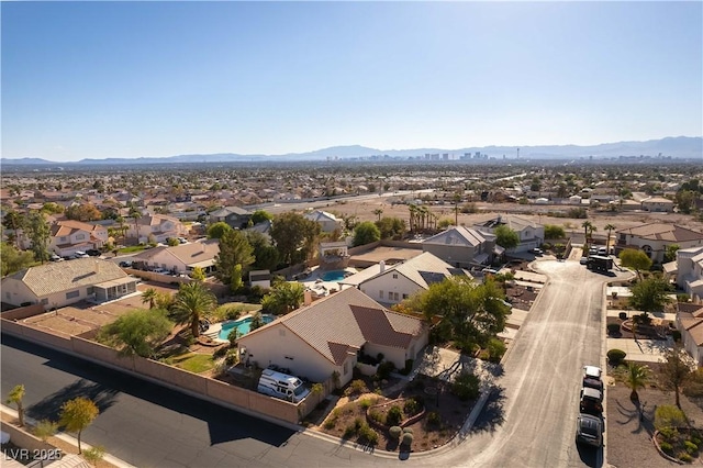 birds eye view of property with a residential view and a mountain view