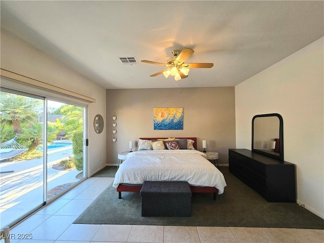 bedroom with light tile patterned floors, baseboards, visible vents, and access to exterior