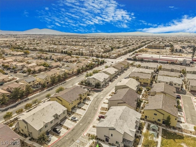 bird's eye view with a mountain view