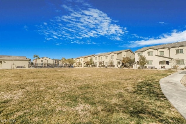 view of community featuring a yard