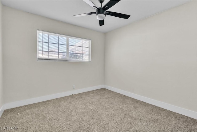 unfurnished room with ceiling fan and carpet floors