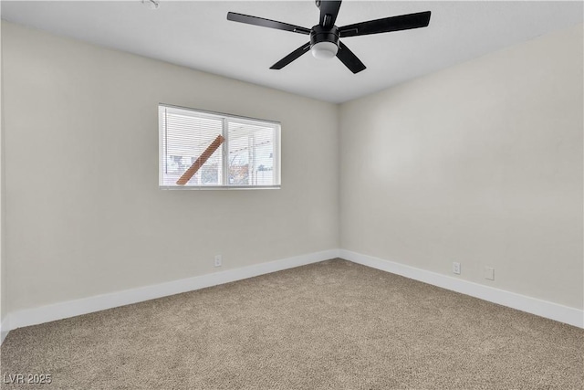 empty room with ceiling fan and carpet