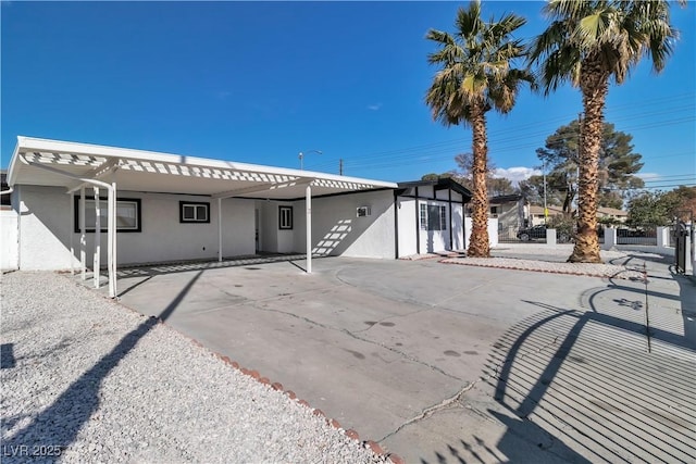 view of front facade with a carport