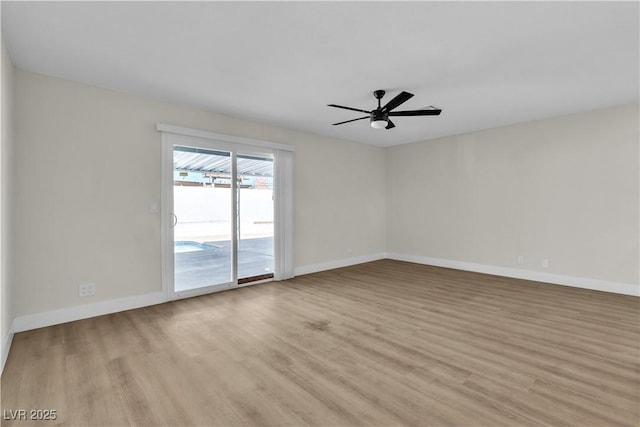 unfurnished room with ceiling fan and light hardwood / wood-style flooring