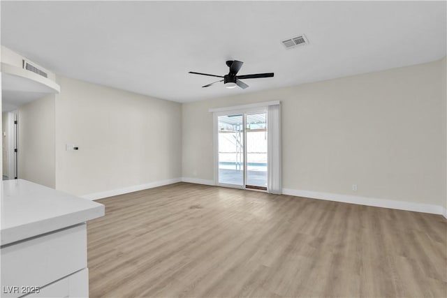 unfurnished living room with ceiling fan and light hardwood / wood-style flooring