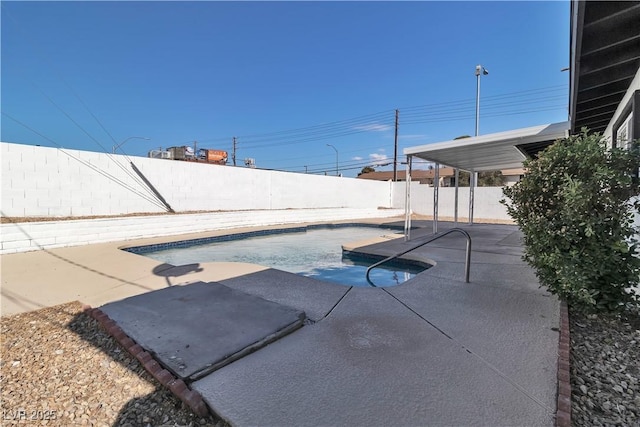 view of pool featuring a patio area