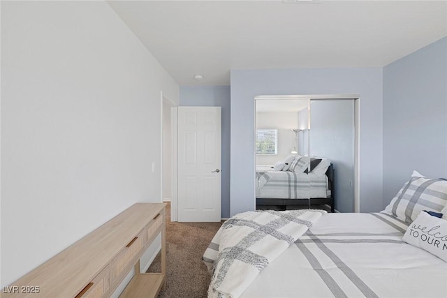 bedroom featuring carpet floors and a closet