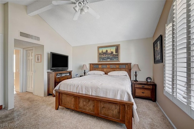 bedroom featuring light colored carpet, visible vents, lofted ceiling with beams, ceiling fan, and baseboards