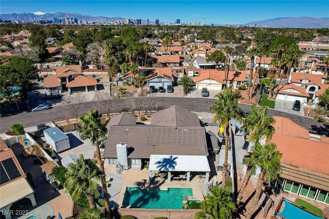 bird's eye view with a residential view and a mountain view