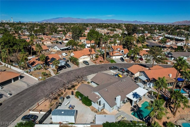 drone / aerial view featuring a mountain view and a residential view