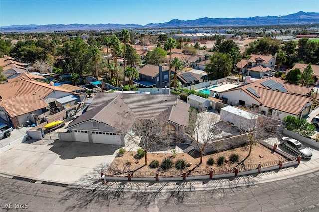 aerial view with a residential view and a mountain view