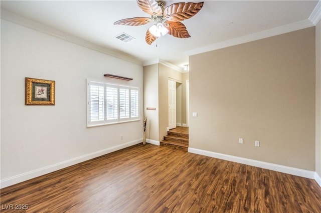 unfurnished room featuring hardwood / wood-style flooring, ornamental molding, and ceiling fan