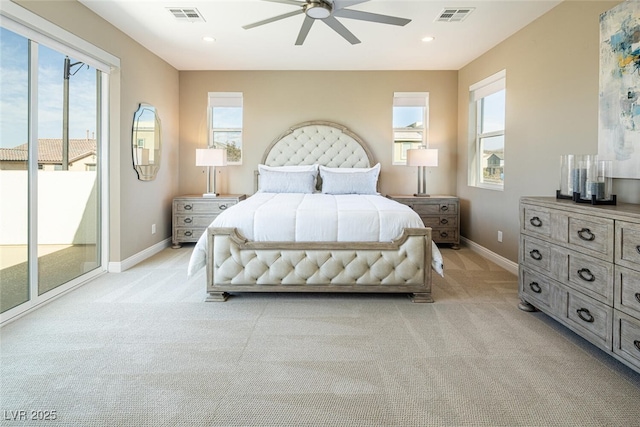 bedroom with access to outside, visible vents, and light colored carpet