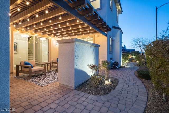 view of patio featuring a pergola