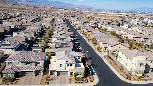 birds eye view of property featuring a residential view and a mountain view