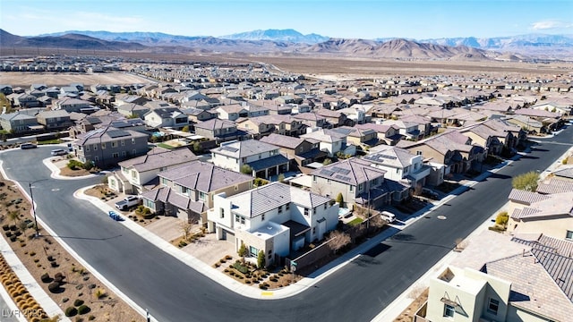 aerial view featuring a residential view and a mountain view