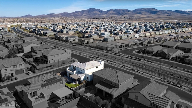 aerial view featuring a mountain view and a residential view