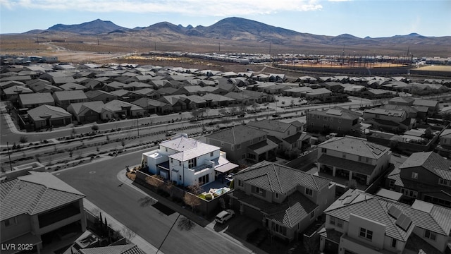 bird's eye view featuring a residential view and a mountain view