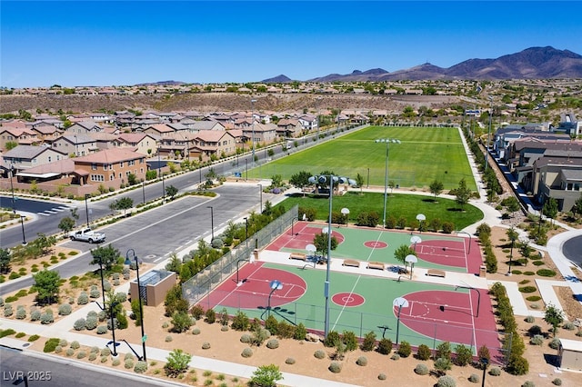 bird's eye view with a residential view and a mountain view