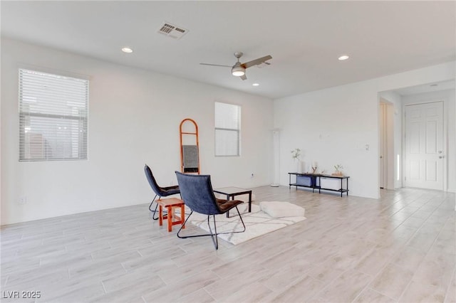 dining room featuring light hardwood / wood-style flooring and ceiling fan