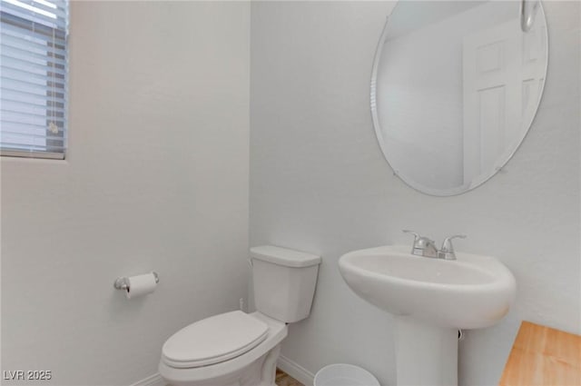 bathroom featuring toilet