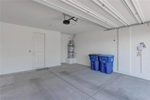 garage featuring secured water heater and a garage door opener