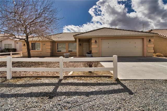 view of front of property featuring a garage