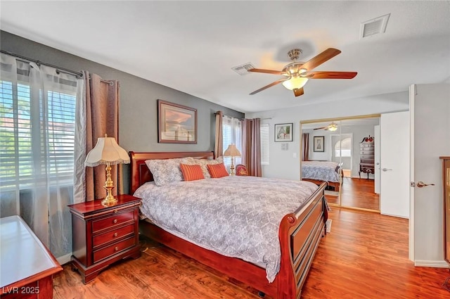 bedroom featuring hardwood / wood-style floors and ceiling fan