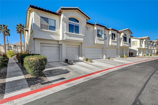 view of property featuring a garage