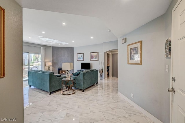 living room with vaulted ceiling